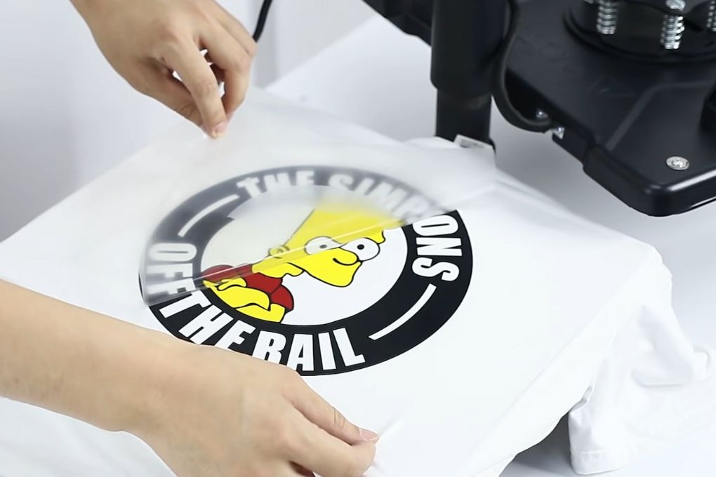 Take out the heat press, then remove the transfer paper